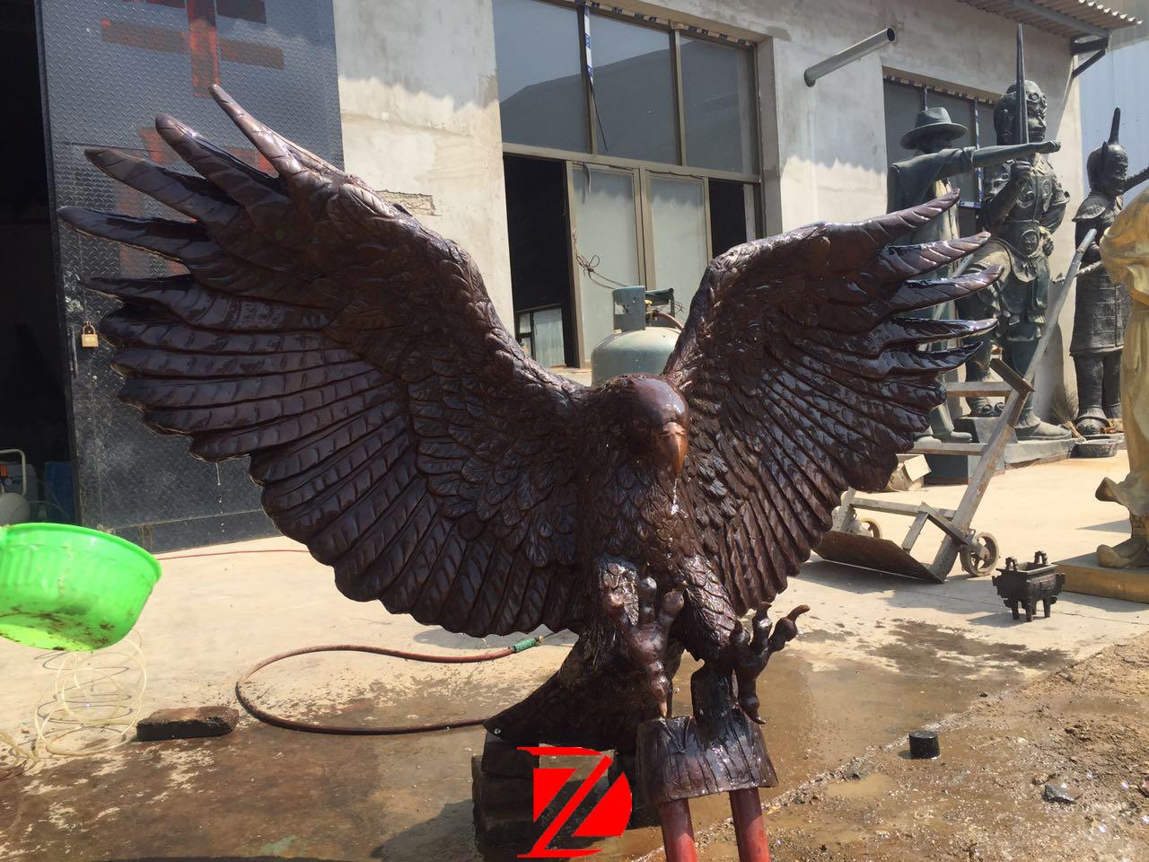 Cast bronze desert eagle statue